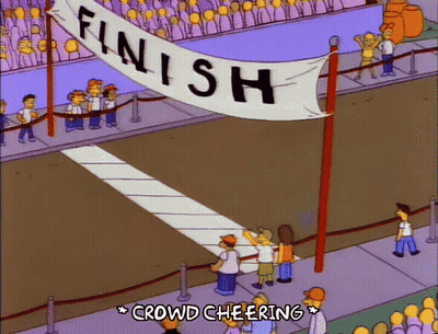 A Cartoon Of A Crowd Cheering At The Finish Line Of A Race . GIF