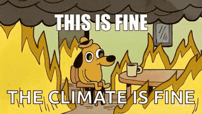 A Cartoon Of A Dog Sitting At A Table With A Cup Of Coffee In Front Of A Fire . GIF
