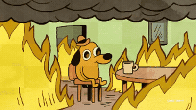 A Cartoon Of A Dog Sitting At A Table With A Cup Of Coffee Surrounded By Fire GIF