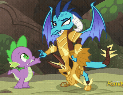 A Cartoon Of A Dragon Standing Next To Another Dragon With Discovery Family Written On The Bottom Right GIF