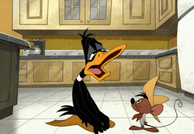 A Cartoon Of A Duck And A Mouse Standing Next To Each Other In A Kitchen GIF