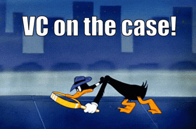 A Cartoon Of A Duck Holding A Magnifying Glass With The Words Vc On The Case Below It GIF