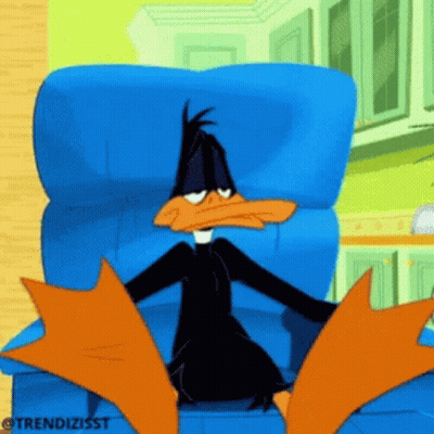 A Cartoon Of A Duck Sitting In A Chair GIF