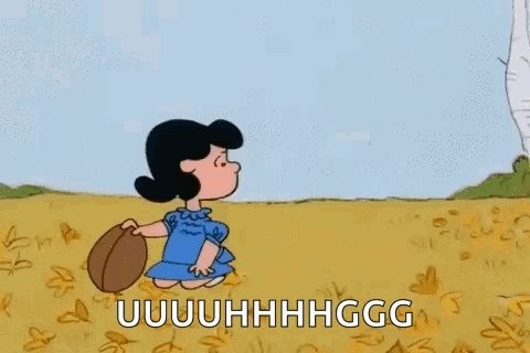 A Cartoon Of A Girl Holding A Football In A Field With The Words `` Uuuuuuuhhhgg '' Written On It . GIF