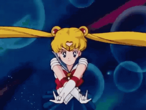 A Cartoon Of A Girl In A Sailor Moon Costume With A Sword In Her Hand . GIF