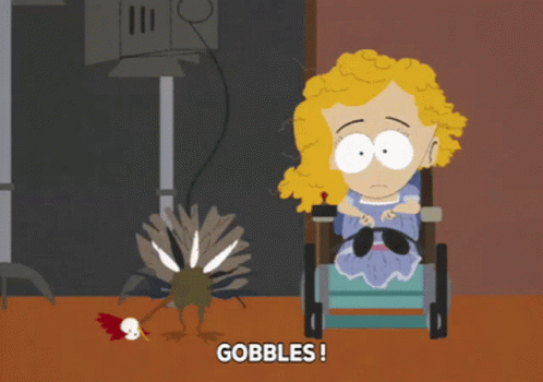A Cartoon Of A Girl In A Wheelchair With The Words Gobbles Below Her GIF