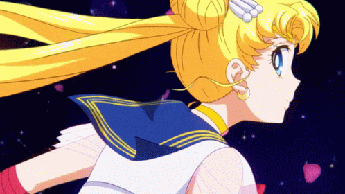 A Cartoon Of A Girl With Blonde Hair And A Blue Sailor Uniform GIF