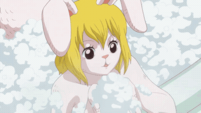A Cartoon Of A Girl With Bunny Ears Holding A Bubble GIF