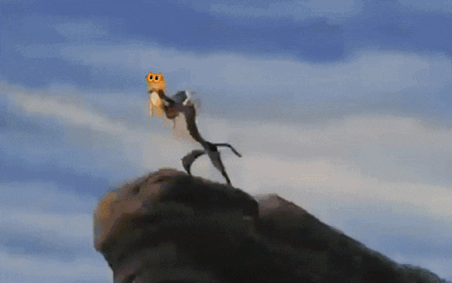 A Cartoon Of A Lion With A Crown On His Head GIF