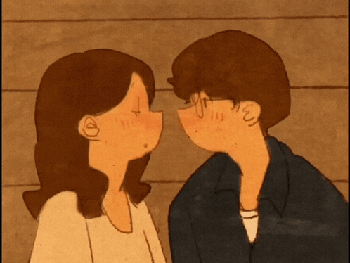 A Cartoon Of A Man And A Woman Kissing With The Letters E And T On Their Faces GIF
