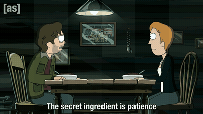 A Cartoon Of A Man And Woman Sitting At A Table With The Words The Secret Ingredient Is Patience GIF