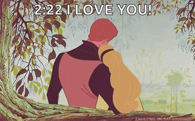 A Cartoon Of A Man And Woman Sitting Under A Tree With 2:22 I Love You Written Above Them GIF