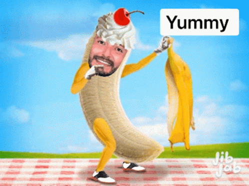 A Cartoon Of A Man Dressed As A Banana With A Cherry On Top And The Word Yummy Above Him GIF