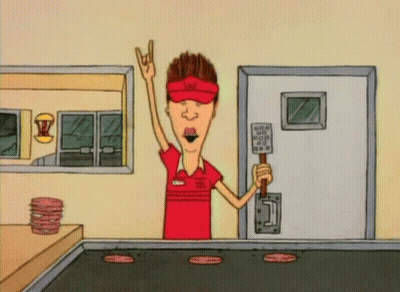 A Cartoon Of A Man Holding A Spatula In A Restaurant GIF