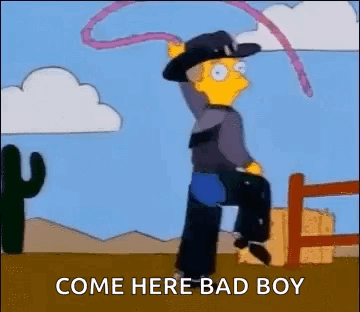 A Cartoon Of A Man In A Cowboy Outfit Holding A Lasso And Says `` Come Here Bad Boy '' . GIF