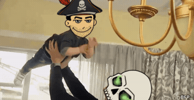 A Cartoon Of A Man In A Pirate Hat Is Being Held Up By Another Person GIF