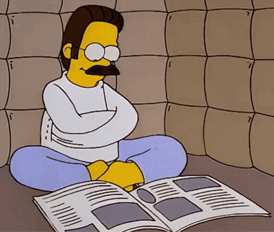 A Cartoon Of A Man In A Strait Jacket Reading A Magazine GIF