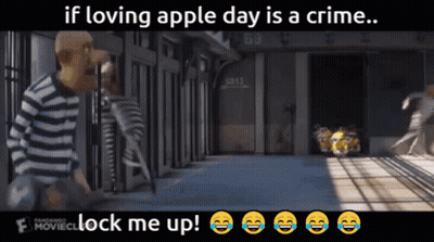 A Cartoon Of A Man In A Striped Shirt With The Words If Loving Apple Day Is A Crime Lock Me Up GIF