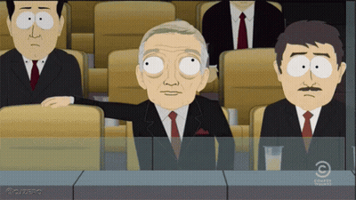 A Cartoon Of A Man In A Suit And Tie Sitting In A Row With A Watermark That Says Comedy Central GIF