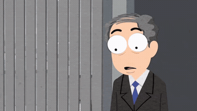 A Cartoon Of A Man In A Suit And Tie Standing In Front Of A Wall GIF