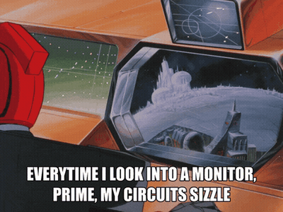 A Cartoon Of A Man Looking Into A Monitor With The Caption " Everytime I Look Into A Monitor Prime My Circuits Sizzle GIF