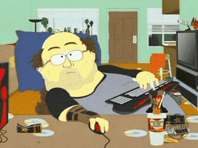 A Cartoon Of A Man Sitting At A Desk With A Keyboard And A Can Of Comedy Crackers GIF