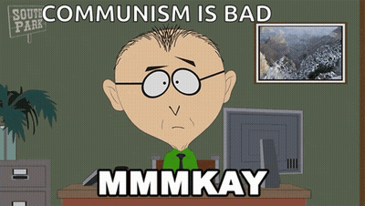 A Cartoon Of A Man Sitting At A Desk With The Words Communism Is Bad Mmmkay GIF
