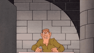 A Cartoon Of A Man Sitting At A Table With A Brick Wall Behind Him GIF