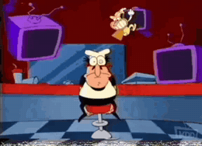 A Cartoon Of A Man Sitting In Front Of A Counter With A Tv On It GIF