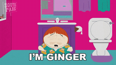 A Cartoon Of A Man Sitting In Front Of A Toilet With The Words I 'M Ginger Below Him GIF
