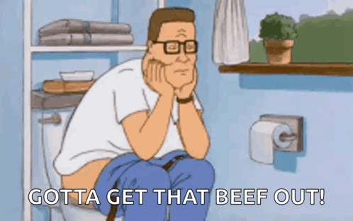 A Cartoon Of A Man Sitting On A Toilet Saying Gotta Get That Beef Out . GIF