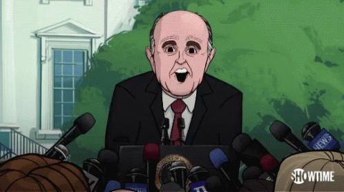 A Cartoon Of A Man Speaking In Front Of Microphones With Showtime Written On The Bottom Right GIF