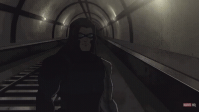 A Cartoon Of A Man Standing In A Tunnel With A Marvel Hq Logo Below Him GIF