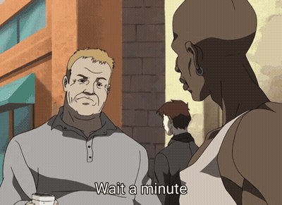 A Cartoon Of A Man Talking To Another Man With Wait A Minute Written Below Him GIF