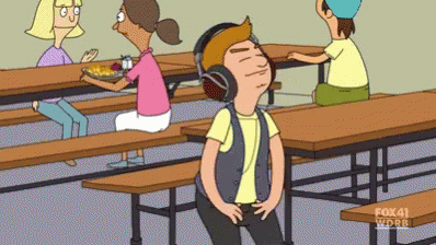 A Cartoon Of A Man Wearing Headphones In A Cafeteria GIF