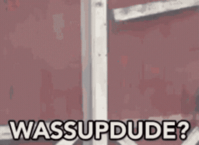 A Cartoon Of A Man With A Beard And Mustache Is Behind The Words Wassup Dude GIF