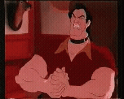 A Cartoon Of A Man With Huge Muscles Is Sitting At A Table With His Hands Folded . GIF