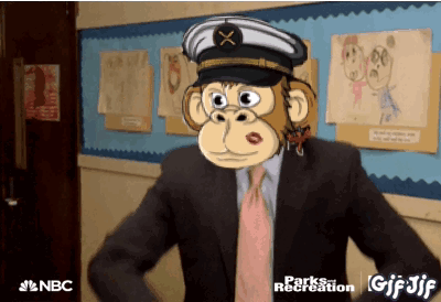 A Cartoon Of A Monkey In A Suit And Tie With A Nbc Logo In The Corner GIF