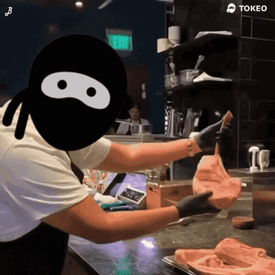 A Cartoon Of A Ninja Holding A Piece Of Meat With The Word Tokeo On The Bottom GIF