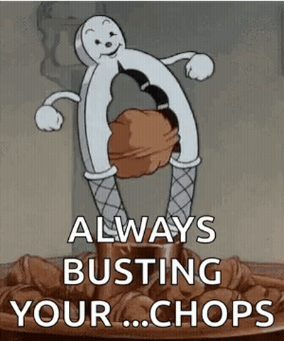 A Cartoon Of A Nutcracker Holding A Nut In His Hand . GIF