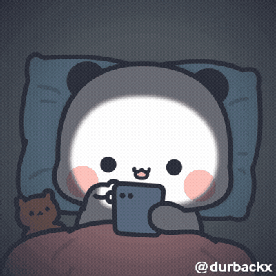 A Cartoon Of A Panda Laying In Bed Looking At A Cellphone GIF