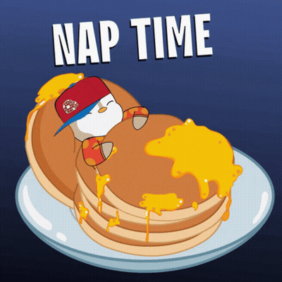 A Cartoon Of A Penguin Sleeping On A Stack Of Pancakes With The Words Nap Time Below It GIF