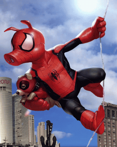 A Cartoon Of A Pig Dressed As Spider-Man Is Hanging From A Rope GIF