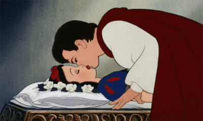 A Cartoon Of A Prince Kissing Snow White While She Is Sleeping GIF