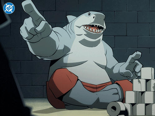 A Cartoon Of A Shark With A Dc Logo On The Bottom Right GIF