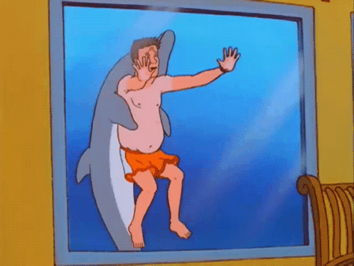 A Cartoon Of A Shirtless Man Standing In Front Of A Dolphin GIF