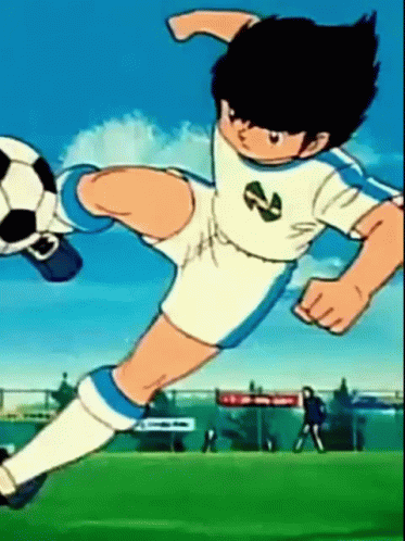 A Cartoon Of A Soccer Player Kicking A Ball GIF