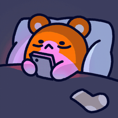 A Cartoon Of A Teddy Bear Laying In Bed With A Cell Phone GIF