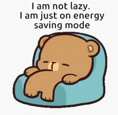 A Cartoon Of A Teddy Bear Laying On A Couch With The Words I Am Not Lazy GIF