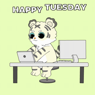 A Cartoon Of A Tiger Sitting At A Desk With A Laptop And A Computer With The Words Happy Tuesday Below It GIF